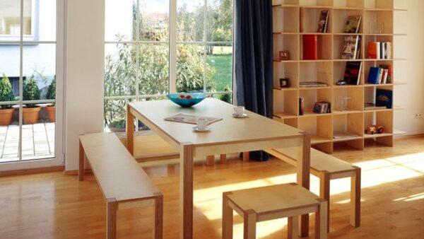 Wooden dining table with benches